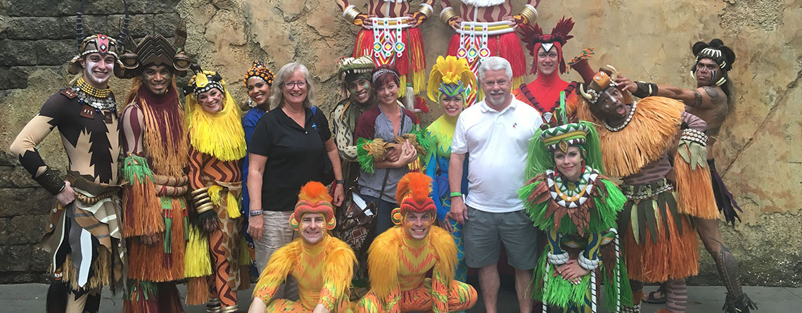Tour Directors Sue Guindon, Paige Carter & Chuck Kubly meeting the cast of “Festival of the Lion King” at Disney’s Animal Kingdom.