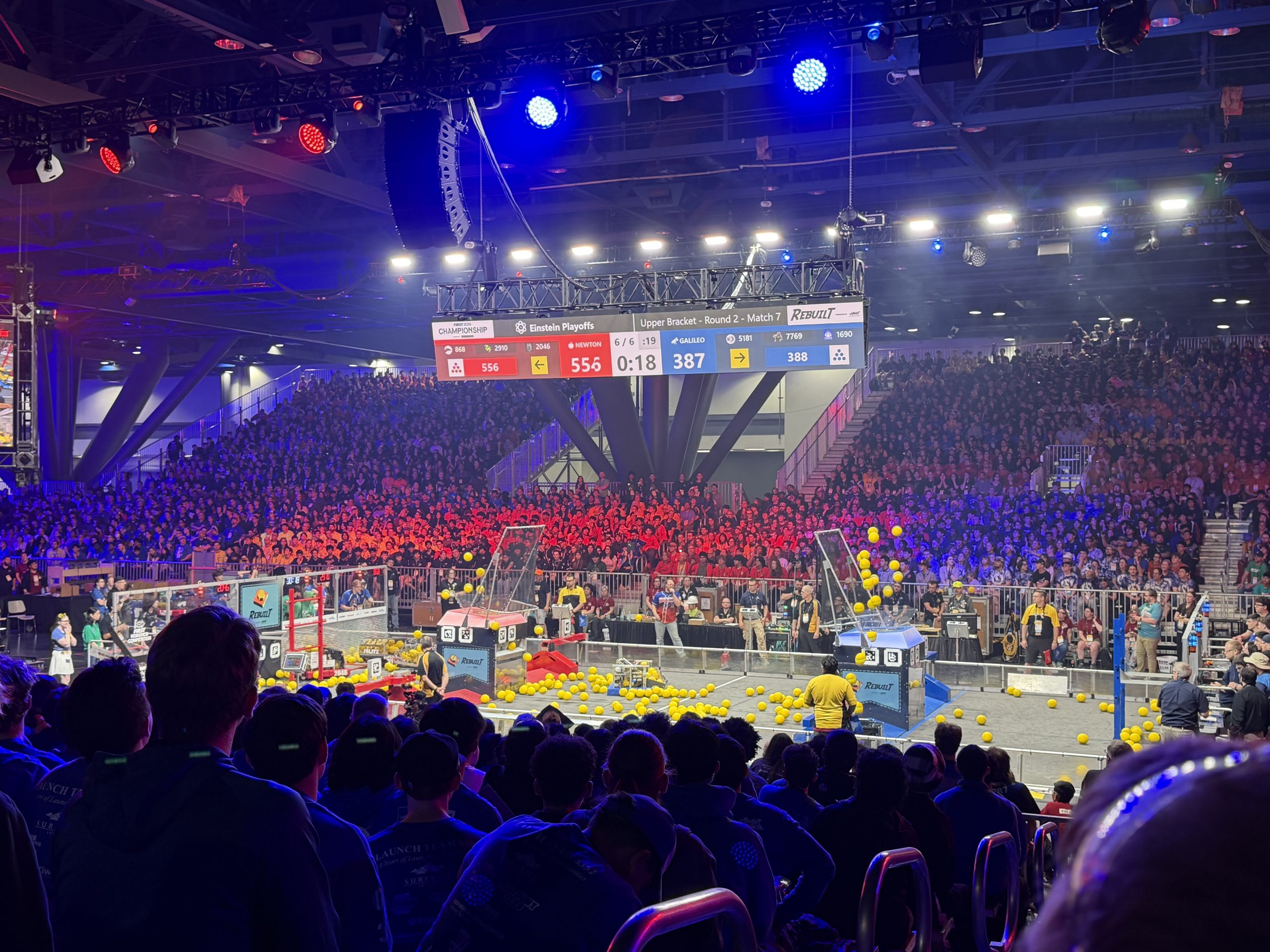 two robotics teams competing at the FIRST Championship