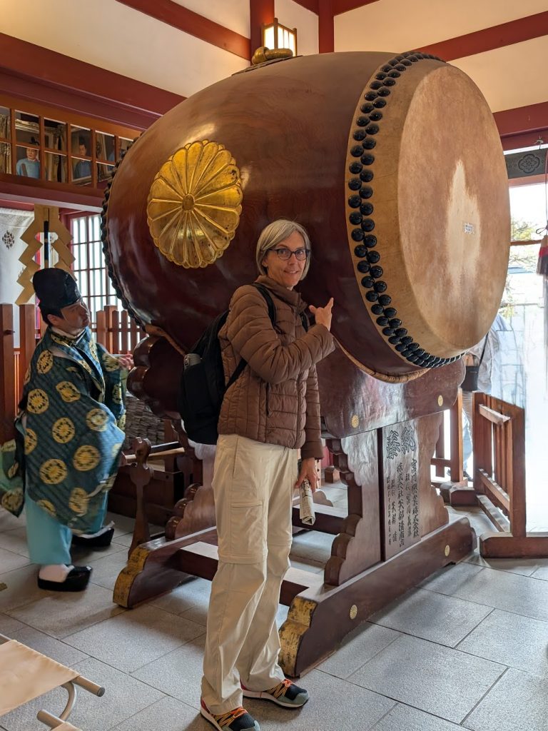 Jen Shenberger posing with a drum